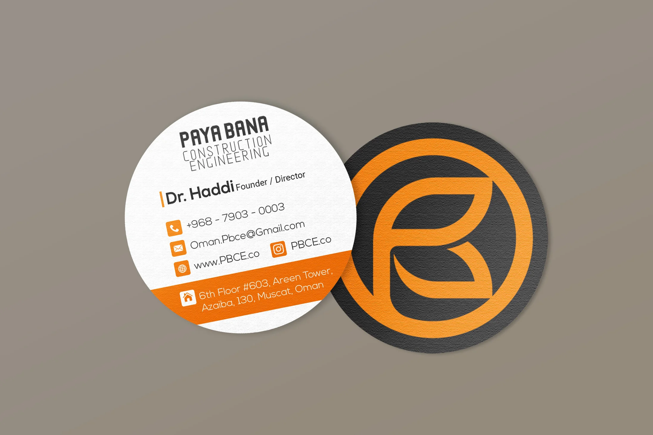 Two round PayaBana Co business cards showing the logo and contact details